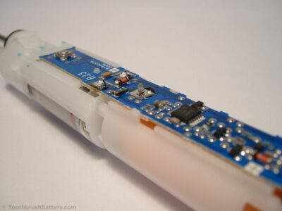 Braun-Oral-B-Vitality-Type-3708-3710-toothbrush-battery-positive-tab-tag-desoldered