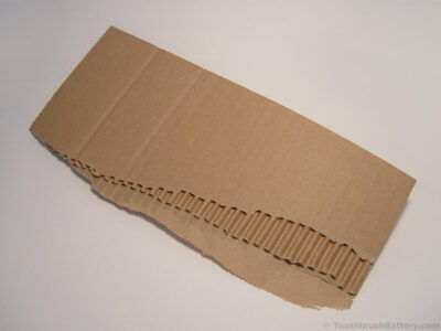 corrugated-cardboard-protect-toothbrush-handle-during-disassembly
